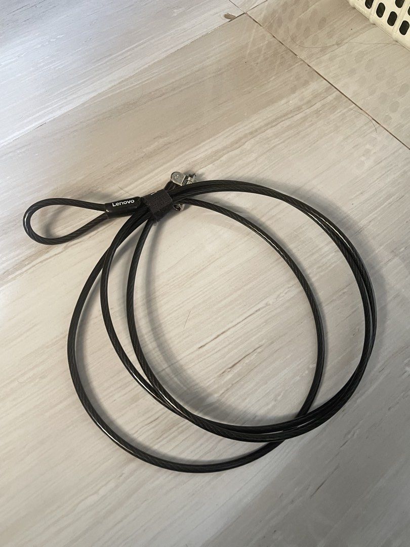 Lenovo Laptop Security Cable Lock with Keys (Category: Laptops & Notebooks) located in Manila. Submitted by young_arvss (Listing ID 1471134791, Image 1). Description: - Genuine Lenovo security cable lock for laptops and notebooks - Ideal for securing your device in offices, coffee shops, or public spaces - Durable long steel cable wrapped in protective black plastic - Standard T-bar lock mechanism fits security slots securely - Convenient loop en