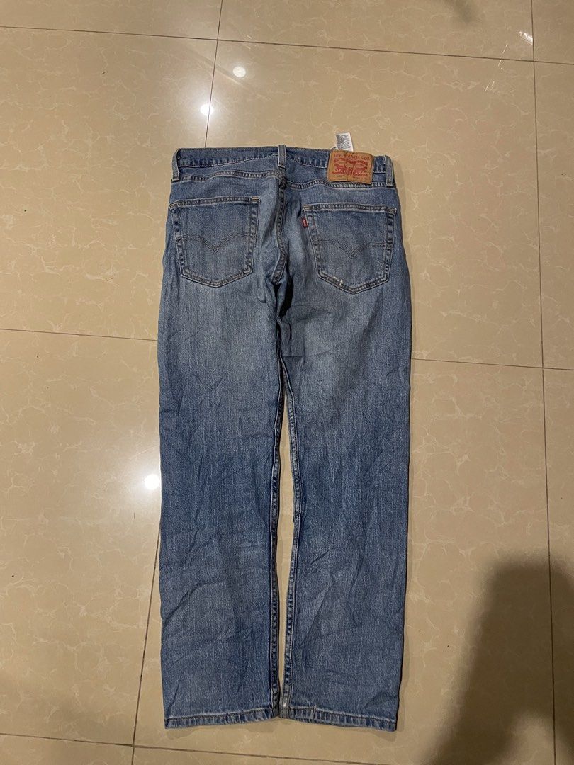 Levi's 502 Regular Taper Jeans W30 L30 (Category: Jeans) located in Davao. Submitted by loythrift30 (Listing ID 1471256917, Image 2). Description: - Brand/Model: Levi's 502 - Size: W30 L30 (marked on back leather patch) - Fit: Regular taper fit - Wash: Medium wash denim with light factory distressing - Details: Classic 5-pocket styling, button fly, copper rivets, and iconic red tab - Condition: Clean throughout with inner care tags intact.