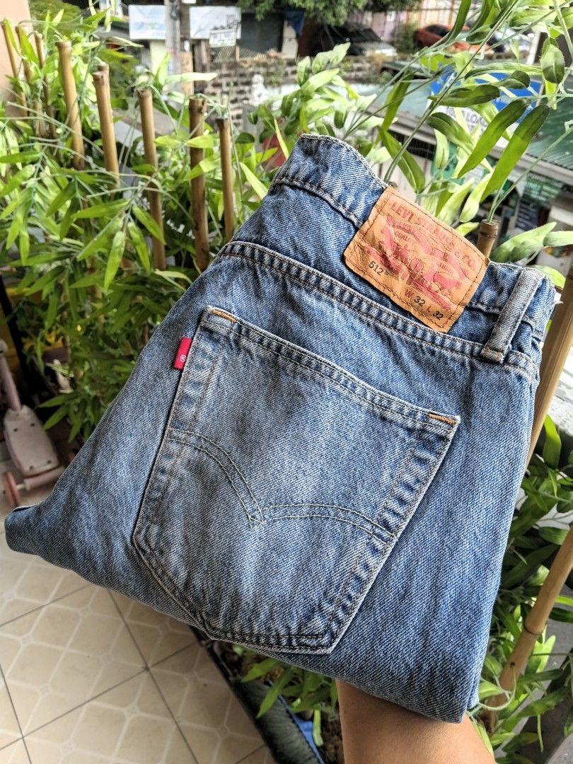 Levi's 512 Slim Taper Jeans W32 L32 Blue (Category: Jeans) located in Manila. Submitted by grandflower-547aee (Listing ID 1471192004, Image 1). Description: - Brand: Levi's 512 Slim Taper Jeans - Size: W32 L32 - Color/Wash: Medium blue wash - Fit: Slim taper, versatile and comfortable for everyday wear - Details: Classic 5-pocket style, zip fly with button closure, leather back patch, and signature red tab - Condition: Great pre-loved condition, 