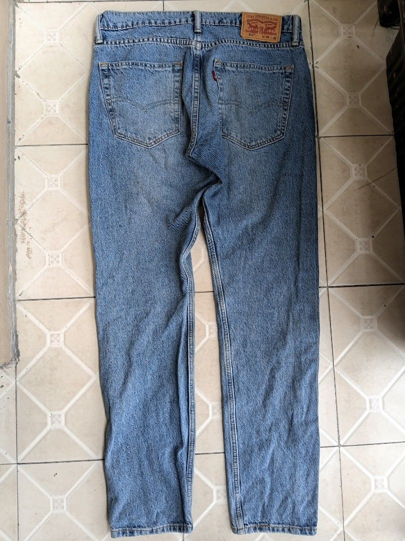 Levi's 512 Slim Taper Jeans W32 L32 Blue (Category: Jeans) located in Manila. Submitted by grandflower-547aee (Listing ID 1471192004, Image 2). Description: - Brand: Levi's 512 Slim Taper Jeans - Size: W32 L32 - Color/Wash: Medium blue wash - Fit: Slim taper, versatile and comfortable for everyday wear - Details: Classic 5-pocket style, zip fly with button closure, leather back patch, and signature red tab - Condition: Great pre-loved condition, 