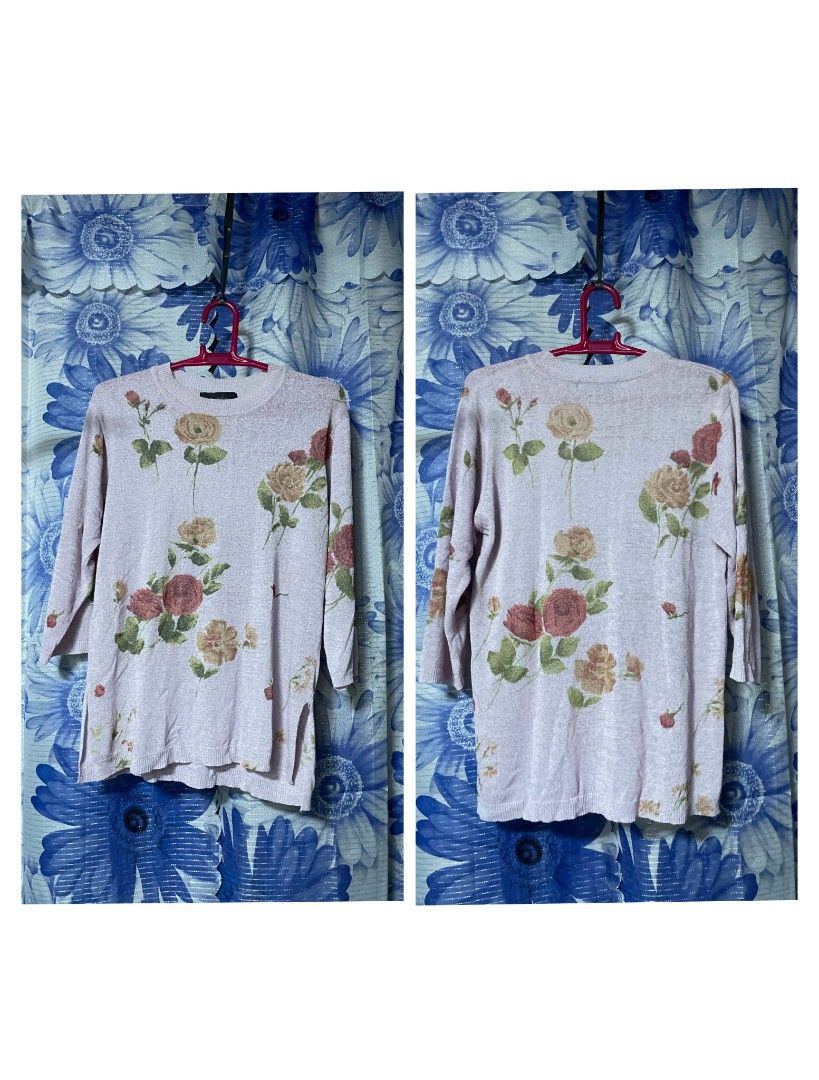 Light Pink Floral Print Knit Sweater (Category: Coats, Jackets and Outerwear) located in Manila. Submitted by arimad.clo (Listing ID 1471168752, Image 1). Description: - Color: Light pink with subtle woven sparkle - Design: Pastel rose and flower prints on front and back - Fit: Relaxed fit with side slits at the hem - Neckline: Crew neck - Sleeves: Three-quarter sleeves - Fabric: Lightweight knit - Condition: Great everyday piece for cooler days.