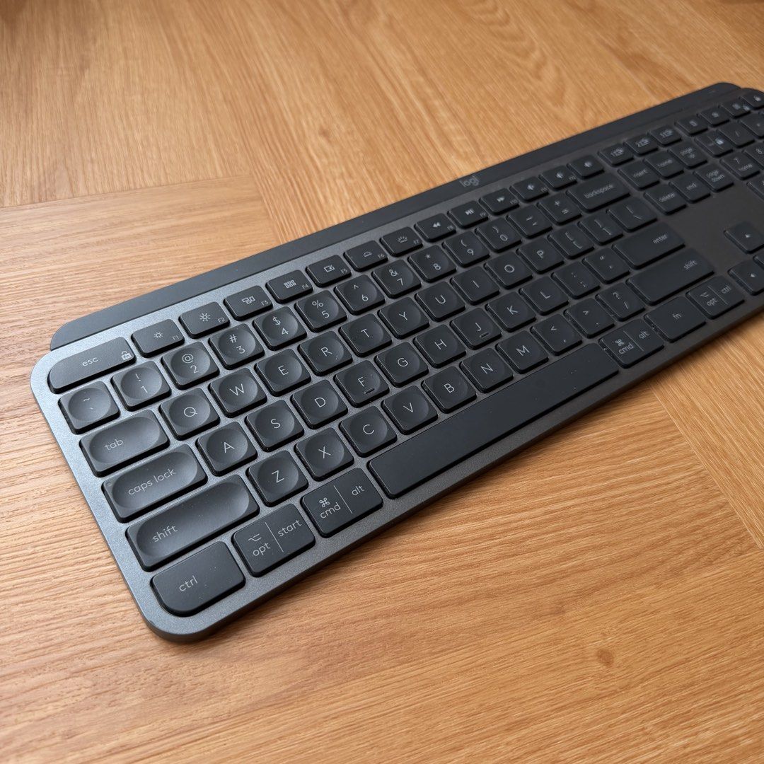 Logitech MX Keys Full Keyboard (Category: Computer Keyboard) located in Subang Jaya. Submitted by neumode (Listing ID 1471177310, Image 2). Description: - Model: Logitech MX Keys Wireless Keyboard - Color: Graphite Grey - Layout: Full-size with numeric keypad and comfortable sculpted keys - Connectivity: Bluetooth or USB receiver - Charging: USB-C rechargeable - Condition: Clean, minimal signs of use, fully functional - Does not come with origina