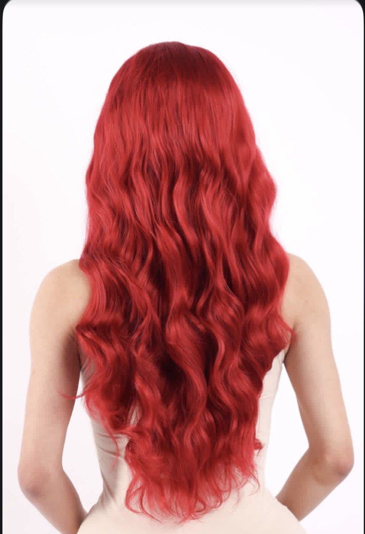 Long Red Wavy Lace Front Wig with Wig Caps (Category: Hair) located in Taguig. Submitted by banannananas (Listing ID 1471266769, Image 1). Description: - Vibrant red, long wavy hair with a chic center part - Lace front construction for a natural, realistic hairline - Versatile styling: perfect for cosplay, drag performances, or everyday fashion - Includes 3 packs of nude HD wig caps (2 pieces per pack, 6 caps total) - Ready to wear and easy to st