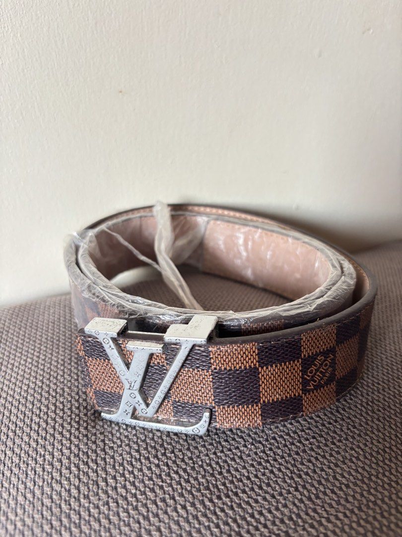 Louis Vuitton belt (Category: Luxury Accessories) located in Manila. Submitted by kingblaize (Listing ID 1471173951, Image 1). Description: Louis Vuitton LV Initiales 40mm Reversible Belt in the Damier Ebene brown checkerboard canvas pattern with a silver-tone LV buckle..