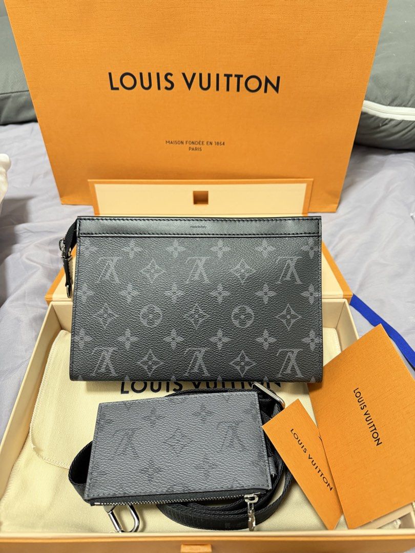 Louis Vuitton Gaston (Category: Luxury Bags & Wallets) located in Manila. Submitted by gabdee08 (Listing ID 1471207870, Image 3). Description: - Brand: Louis Vuitton - Model: Gaston - Material/Color: Monogram Eclipse canvas (Dark grey and black) - Features: Multiple pouches, adjustable strap, clean hardware, and structured shape - Origin: Made in Italy stamp visible near top edge - Inclusions: Original presentation box, dust bag, gift bag, and ca