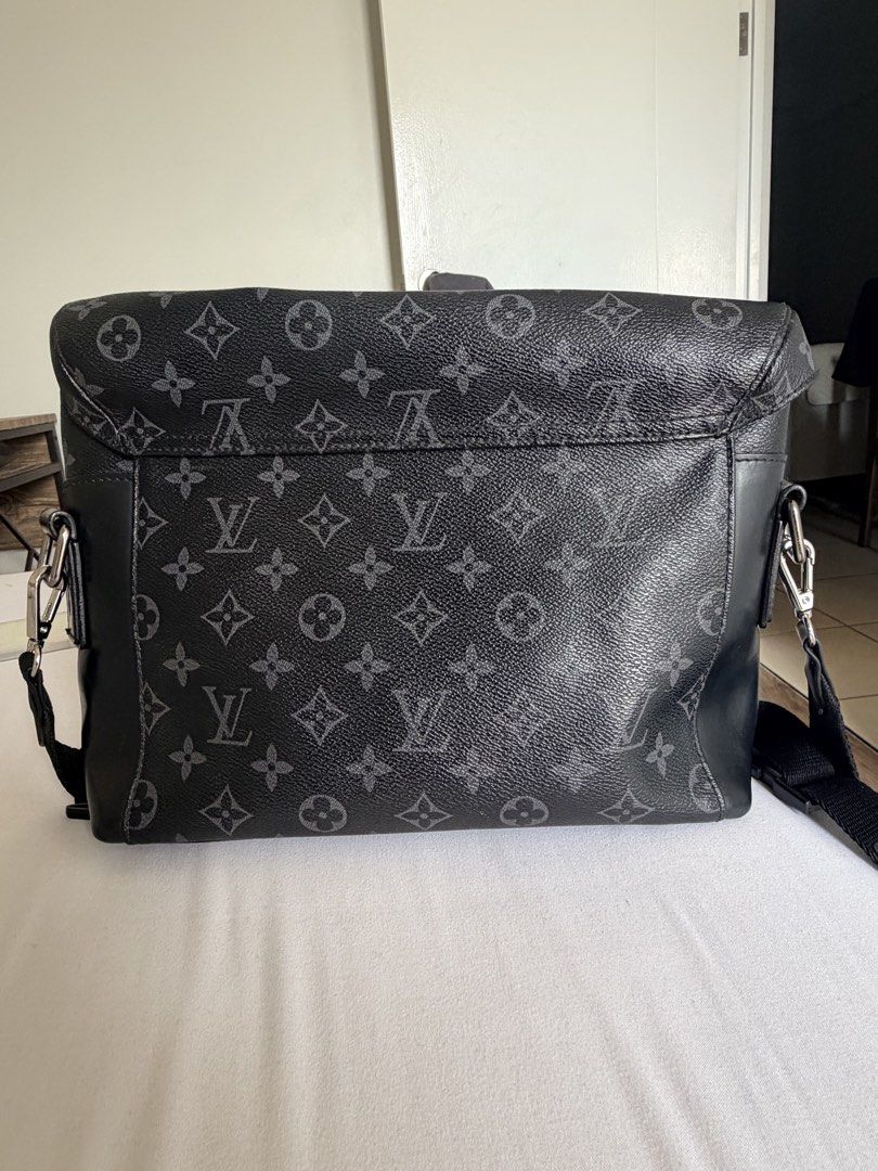 Louis Vuitton Monogram Eclipse Messenger Bag Defile Homme 2016 (Category: Luxury Bags & Wallets) located in Paranaque City. Submitted by kimkurtt (Listing ID 1471131505, Image 2). Description: -Louis Vuitton Messenger Bag from the Automne-Hiver 2016 men's runway collection - Crafted from dark Monogram Eclipse canvas with sleek black leather trim - Silver-tone hardware featuring custom clasps and engraved zipper pulls - Spacious main compartment w