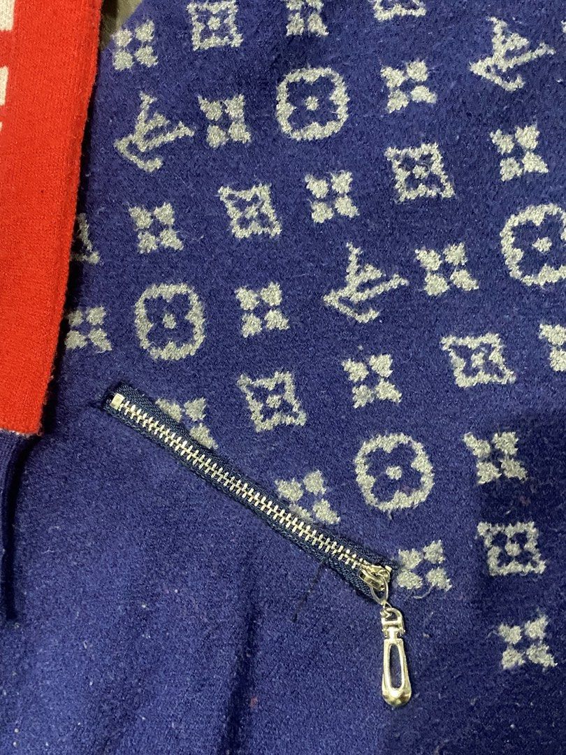 Louis Vuitton Monogram Knit Sweater Blue Red Size S (Category: Longsleeves) located in Rizal. Submitted by dripprojectph (Listing ID 1471223742, Image 3). Description: - Brand: Louis Vuitton - Item: Monogram Crewneck Sweater - Color: Blue with red shoulder accents - Size: Small - Details: Striped ribbed cuffs and zipper detail near bottom hem - Origin: LV Japan branding on care label - Condition: Excellent.