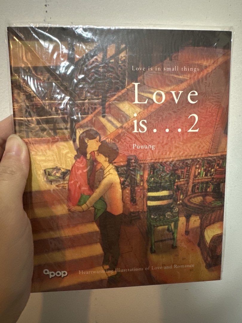 Love is in small things 2 by Puuung (Category: Storybooks) located in Manila. Submitted by lunalux09 (Listing ID 1471265902, Image 1). Description: - Title: Puuung Volume 2 (English Edition) - Publisher: apop - Condition: Brand new, still sealed in original plastic wrapping - Content: Heartwarming and cozy illustrations celebrating everyday moments of love and romance - Perfect as a gift or a cute addition to your bookshelf!.
