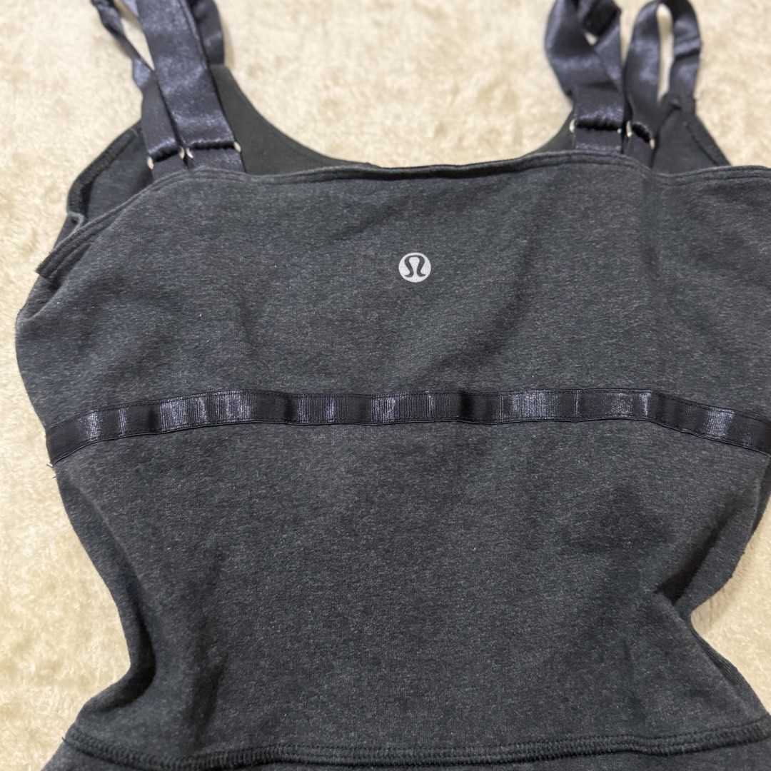 Lululemon Black Strappy Longline Tank Top with Padding – dot 4 (Category: Activewear) located in Pasay City. Submitted by bellita_05 (Listing ID 1471247849, Image 1). Description: Classic Lululemon longline tank top in black, featuring a flattering fitted waist, flared hem and delicate strappy back. • Brand: Lululemon • Size: 4 (based on size dot) • Colour: Charcoal grey • Strappy adjustable shoulder straps • Padded cups • Flared A-line silhouett