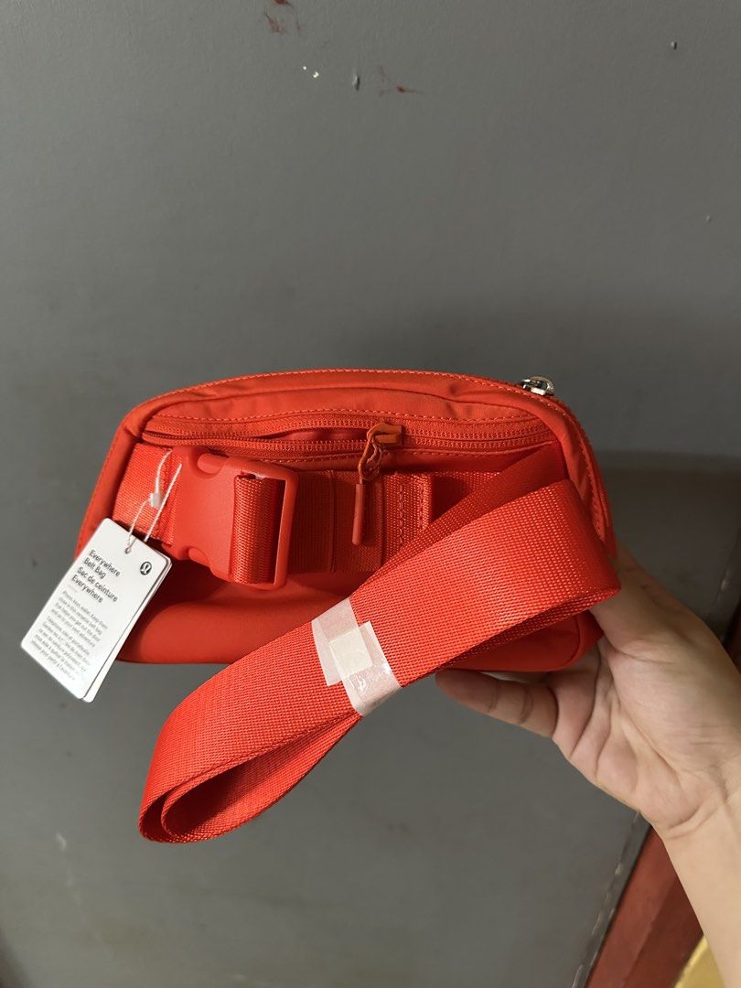 Lululemon Everywhere Belt Bag Red / Crimson (Category: Cross-body Bags) located in Bulacan. Submitted by ccapz19 (Listing ID 1471249403, Image 2). Description: - Brand new with tags (BNWT) Lululemon Everywhere Belt Bag in a vibrant bright red - Made from durable, high-quality nylon material - Secure zippered main compartment with convenient interior mesh slip pockets - Extra exterior back zip pocket for easy access to essentials - Adjustable stra