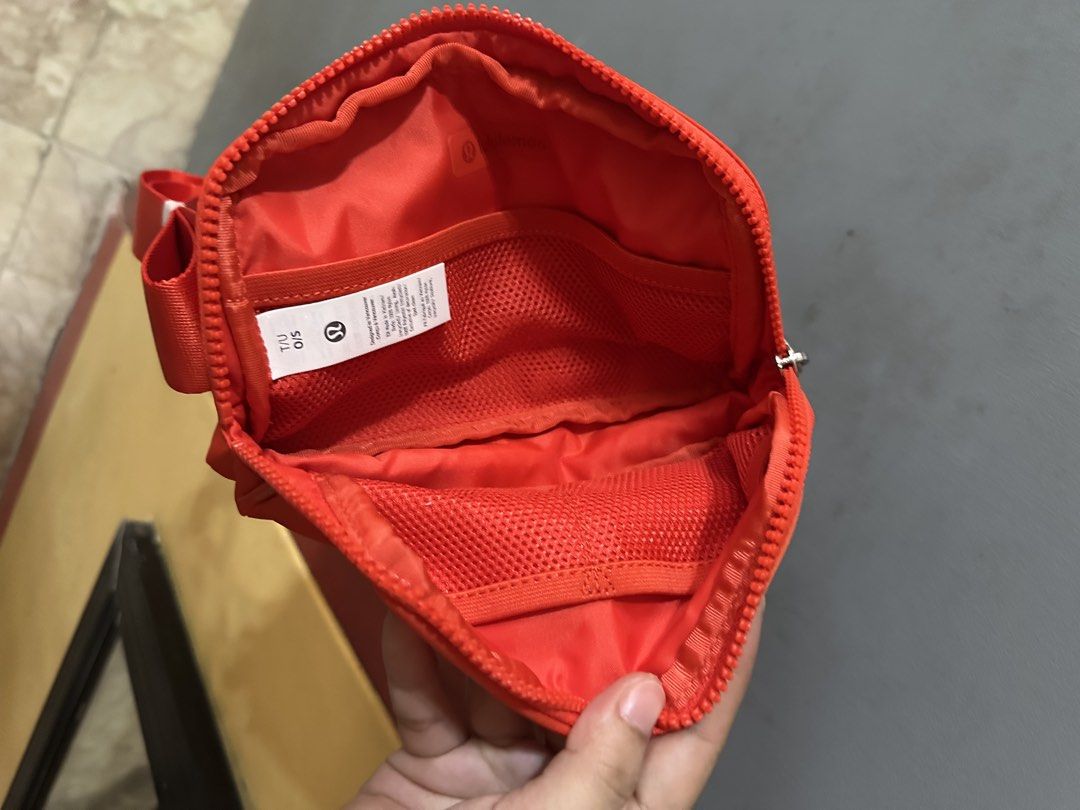 Lululemon Everywhere Belt Bag Red / Crimson (Category: Cross-body Bags) located in Bulacan. Submitted by ccapz19 (Listing ID 1471249403, Image 3). Description: - Brand new with tags (BNWT) Lululemon Everywhere Belt Bag in a vibrant bright red - Made from durable, high-quality nylon material - Secure zippered main compartment with convenient interior mesh slip pockets - Extra exterior back zip pocket for easy access to essentials - Adjustable stra