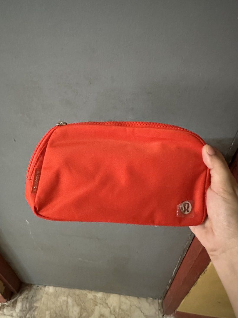 Lululemon Everywhere Belt Bag Red / Crimson (Category: Cross-body Bags) located in Bulacan. Submitted by ccapz19 (Listing ID 1471249403, Image 1). Description: - Brand new with tags (BNWT) Lululemon Everywhere Belt Bag in a vibrant bright red - Made from durable, high-quality nylon material - Secure zippered main compartment with convenient interior mesh slip pockets - Extra exterior back zip pocket for easy access to essentials - Adjustable stra