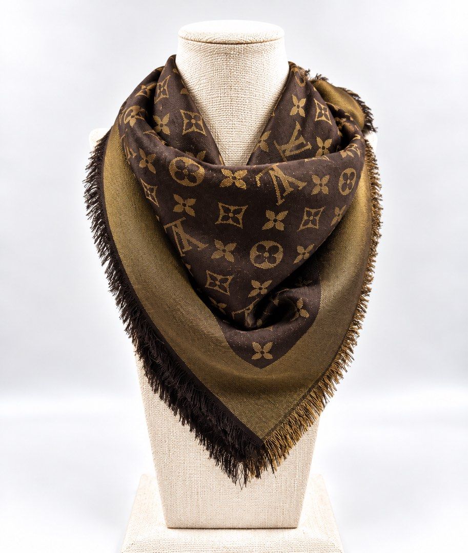 ⚜️LV Timeless Monogram brown scarf (Category: Luxury Accessories) located in Makati City. Submitted by 90sangel (Listing ID 1471288800, Image 1). Description: •Item: Louis Vuitton - Timeless monogram brown /gold black combi scarf 🖤🤎 •Condition: Brand New condition w/ paperbag *100% Elegant silk travel scarf Lightweight and breathable, this scarf is ideal for travel, effortlessly transitioning from day to night. Its stunning sheen adds a touch o