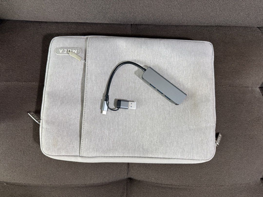 MacBook Laptop with Charger, Hub and Case (Category: Laptops & Notebooks) located in Quezon City. Submitted by safeflower.a95850 (Listing ID 1471141232, Image 3). Description: - Model: MacBook in Space Grey - Battery Health: 86% (Normal condition) - Exterior: Clean outer chassis with minimal wear - Screen: Crisp, high-resolution display - Keyboard: Standard layout with built-in fingerprint sensor - Included Accessories: Original power adapter, US