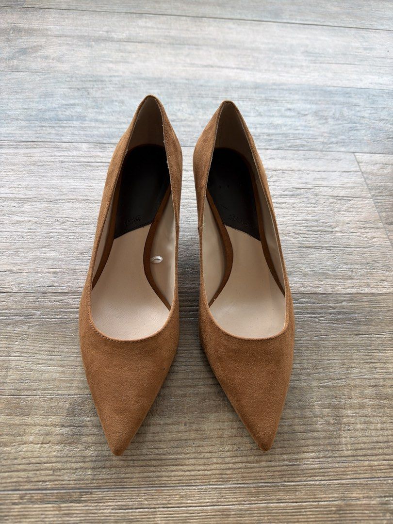Mango Brown Suede Pointed-Toe Kitten Heels Size 37 (Category: Heels) located in Manila. Submitted by evegalvez (Listing ID 1471168620, Image 1). Description: - Brand: Mango - Type: Brown suede pumps - Size: 37 - Features: Pointed toe and comfortable kitten heel - Condition: Brand new, never worn outdoors, protective plastic film still on soles - Color: Neutral cognac, great for both office and casual outfits.