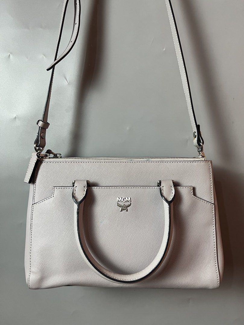 Mcm Leather two way bag (Category: Cross-body Bags) located in Quezon City. Submitted by theideal (Listing ID 1471143886, Image 2). Description: Read first before buy Legit/Authentic McM leather two way bag Medium size Still in good and presentable condition No major flaws Minor sign of use only See picture details posted.