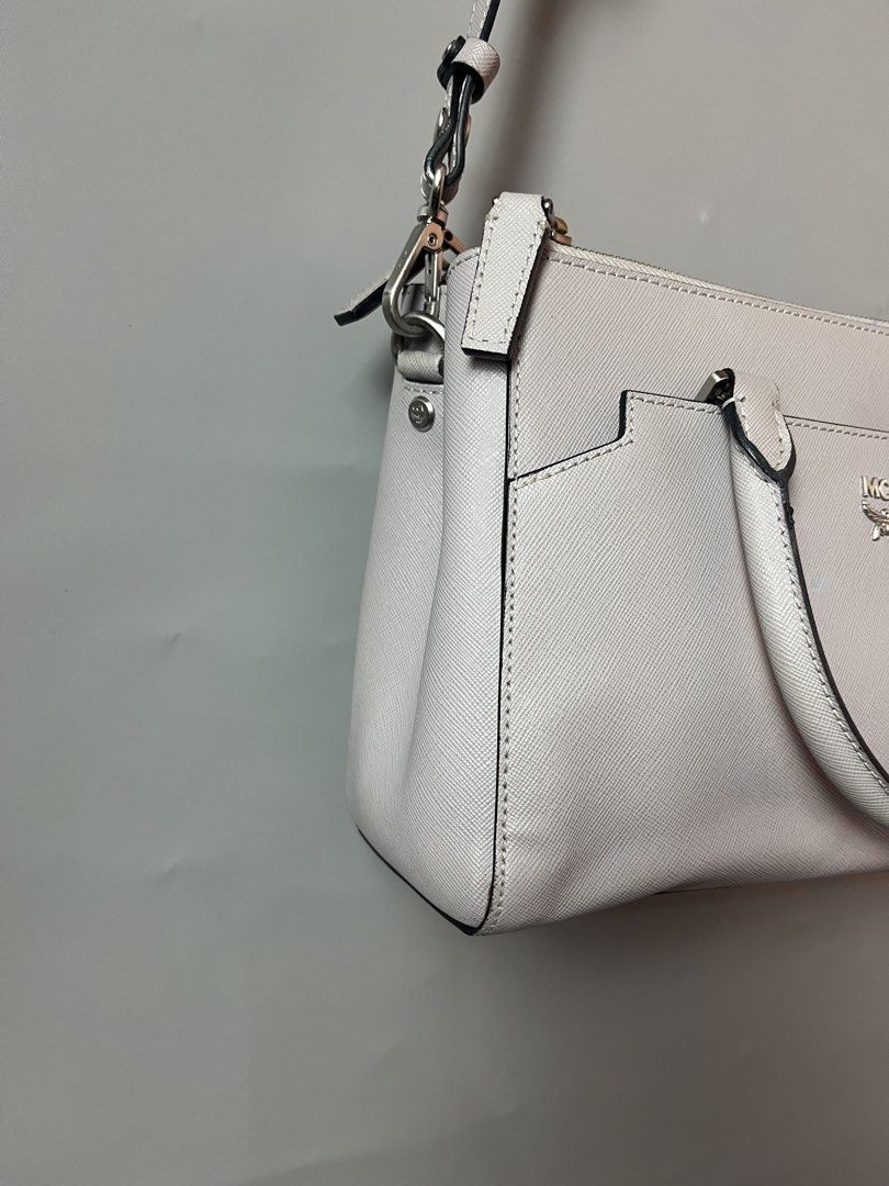 Mcm Leather two way bag (Category: Cross-body Bags) located in Quezon City. Submitted by theideal (Listing ID 1471143886, Image 3). Description: Read first before buy Legit/Authentic McM leather two way bag Medium size Still in good and presentable condition No major flaws Minor sign of use only See picture details posted.