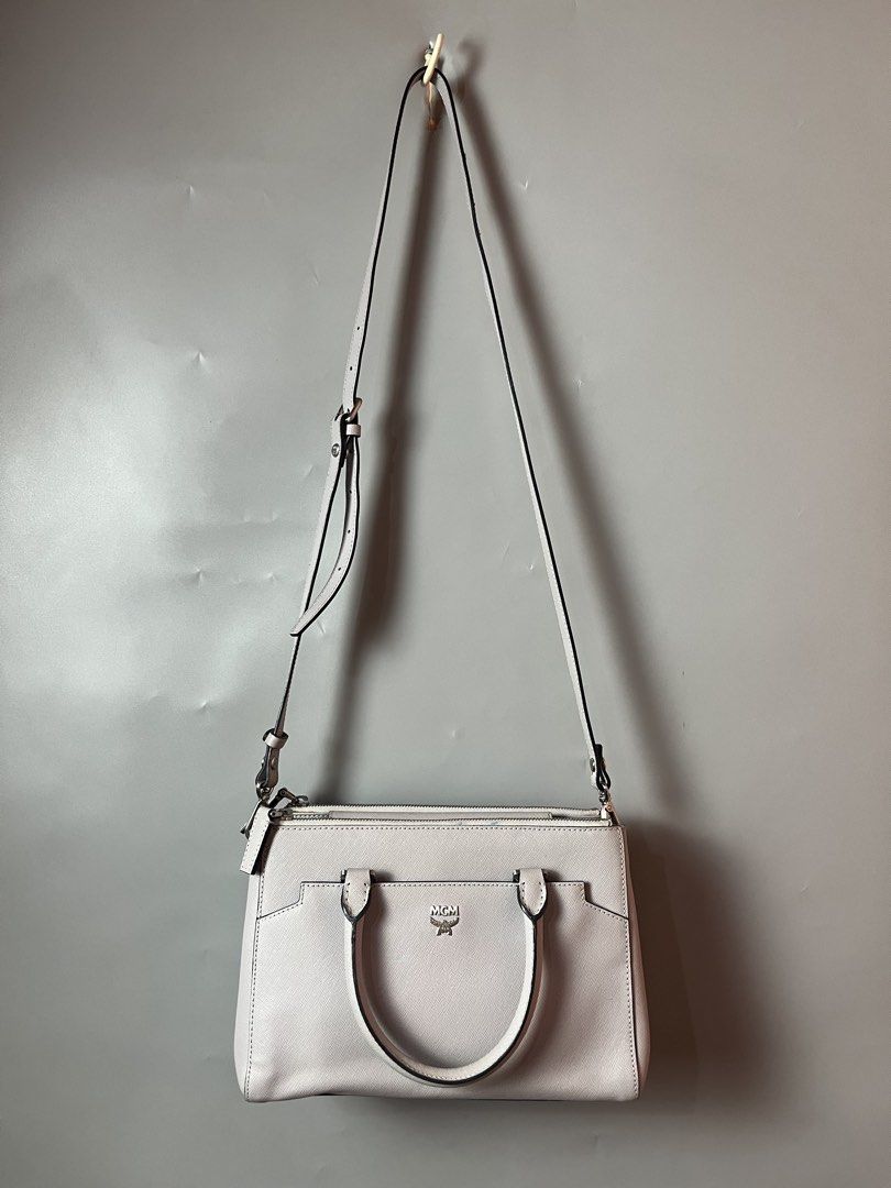 Mcm Leather two way bag (Category: Cross-body Bags) located in Quezon City. Submitted by theideal (Listing ID 1471143886, Image 1). Description: Read first before buy Legit/Authentic McM leather two way bag Medium size Still in good and presentable condition No major flaws Minor sign of use only See picture details posted.