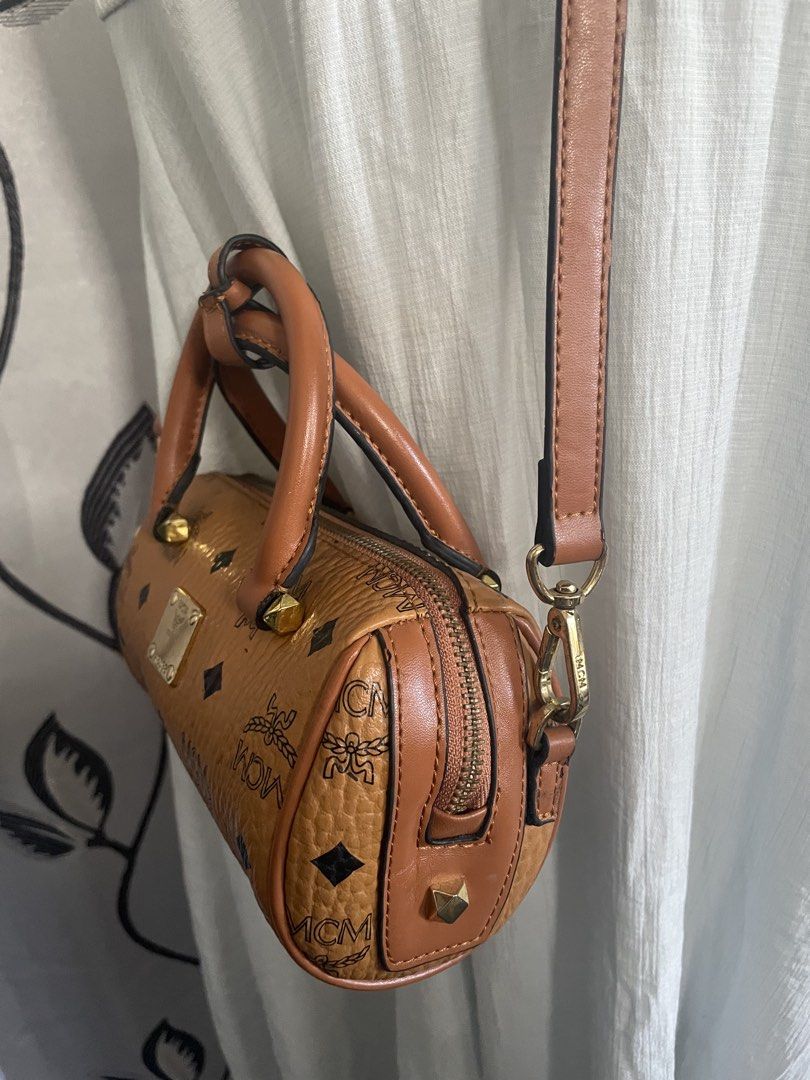 MCM mini boston / barrel bag (Category: Luxury Bags & Wallets) located in Cabanatuan. Submitted by moraiahraven (Listing ID 1471155682, Image 2). Description: .