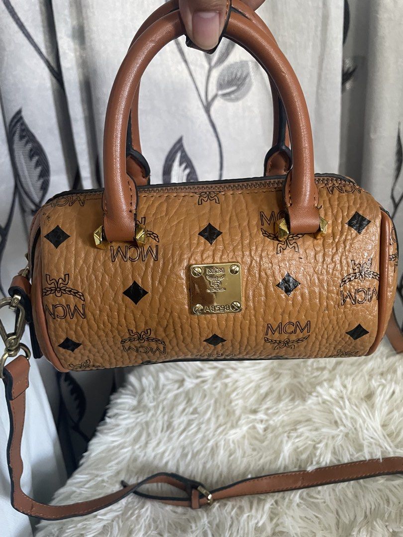 MCM mini boston / barrel bag (Category: Luxury Bags & Wallets) located in Cabanatuan. Submitted by moraiahraven (Listing ID 1471155682, Image 3). Description: .