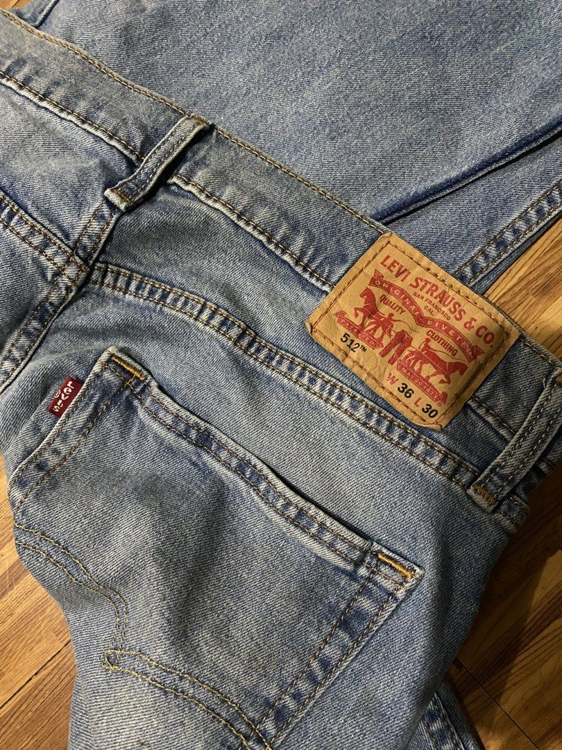 Medium Denim Wash Jeans (Category: Jeans) located in Manila. Submitted by ellieeeeee0293929 (Listing ID 1471123738, Image 2). Description: - Brand/Model: Levi's 512 Slim Taper Jeans - Wash: Medium denim wash - Details: Classic 5-pocket styling, zip fly with button closure, leather waist patch, and signature red tab - Size: Waist 36, Length 30 - Condition: Great everyday staple piece.