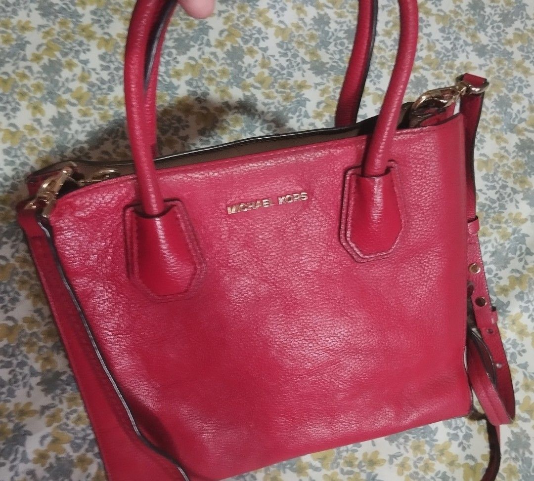 Michael Kors Red Leather Tote Bag (Category: Tote Bags) located in Manila. Submitted by lene48 (Listing ID 1471139978, Image 2). Description: - Brand: Michael Kors - Color: Bright red - Material: Pebbled leather with gold-tone hardware - Straps: Dual top carry handles and matching adjustable shoulder strap - Closure: Secure zipper closure - Interior: Clean fabric lining with signature logo plate tag - Condition: Clean inside and out, ready to use