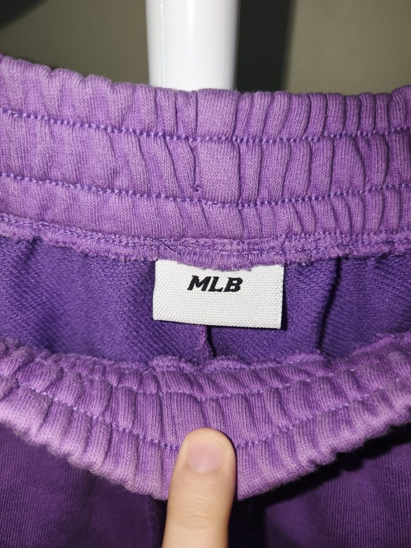 MLB LA Dodgers Jogger Sweatpants (Category: Joggers) located in Davao. Submitted by jjj_mncd (Listing ID 1471156639, Image 2). Description: color: Lavender overall condi: 9/10 hem/cuff condi: 8.5/10 may light fade may minor washable dirt size: Small to Medium length: 37 - Authentic MLB Los Angeles Dodgers purple sweatpants - Size: 155 with genuine merchandise tag attached - Features embroidered LA logo on the leg - Adjustable drawstring elastic w