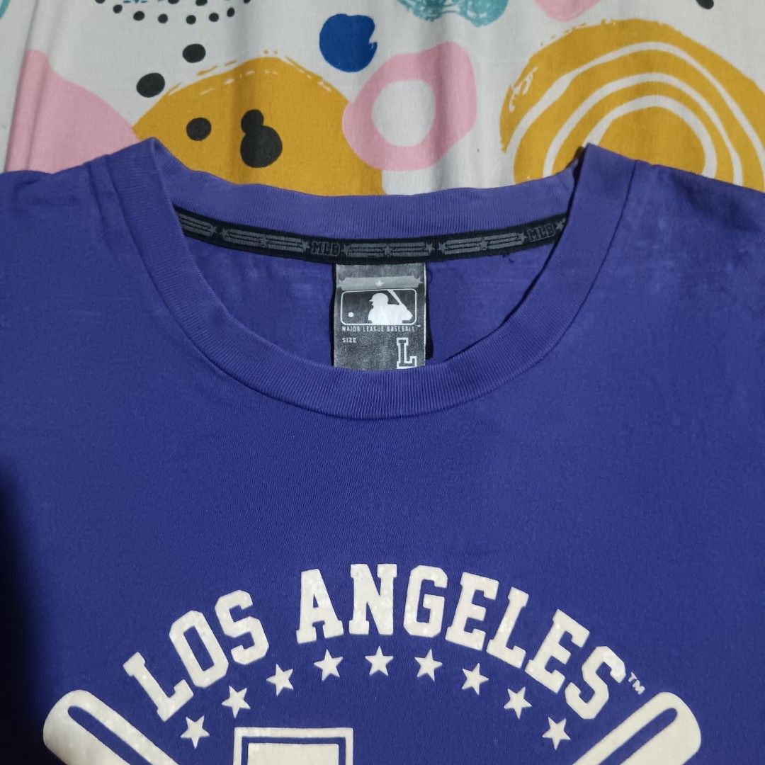 MLB Los Angeles Dodgers (Category: Tshirts & Polo Shirts ) located in Mandaluyong City. Submitted by something_thrift. (Listing ID 1471185687, Image 2). Description: MLB Los Angeles Dodgers size Large on tag dimes 20"x29.5" 📍Mandaluyong City.