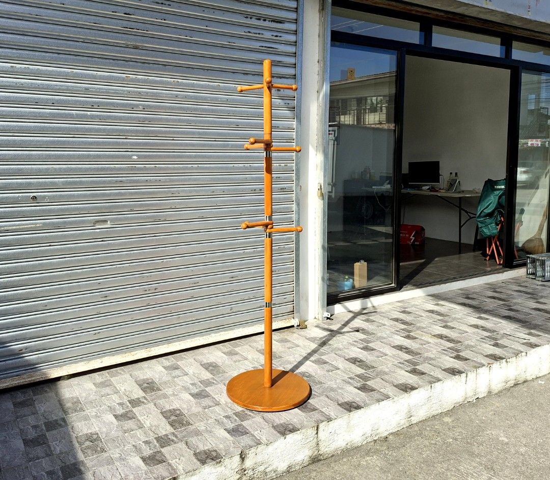 Modern wooden hat / coat rack (Category: Shelves, Cabinets & Racks) located in Mabalacat. Submitted by thenewcraf32843 (Listing ID 1471127766, Image 2). Description: Modern wooden hat / coat rack In great condition. Solid wood, sturdy. Dimensions: Base diameter 18 x Height 70 inches Price: 2.8k only We do shipping via lalamove / victory liner drop & go. Dm to inquire.
