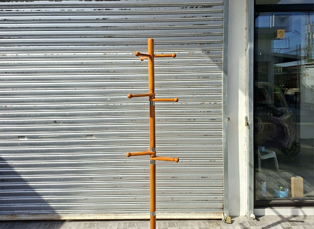 Modern wooden hat / coat rack (Category: Shelves, Cabinets & Racks) located in Mabalacat. Submitted by thenewcraf32843 (Listing ID 1471127766, Image 3). Description: Modern wooden hat / coat rack In great condition. Solid wood, sturdy. Dimensions: Base diameter 18 x Height 70 inches Price: 2.8k only We do shipping via lalamove / victory liner drop & go. Dm to inquire.