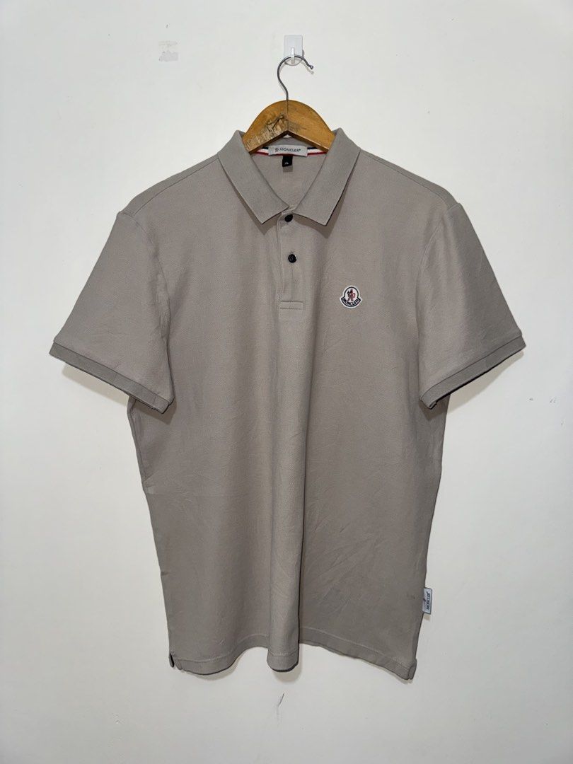 Monclear Light Brown Polo Shirt (Category: Luxury Apparel) located in Bacolod City. Submitted by thriftppy_ (Listing ID 1471154328, Image 1). Description: MONCLEAR LIGHT BROWN POLO SHIRT Size: XL Width: 22 Length: 28 Color rate: 9.8/10 Condition: Excellent near new Issue: None 💰1.5 DM for sure buyers 📥 Mode of payment:GCASH, BANK TRANSFER Unli vouch and vc for safety transaction. 📌Color may vary due to lighting📸 📦 Shipping via JNT EXPRESS🚚 