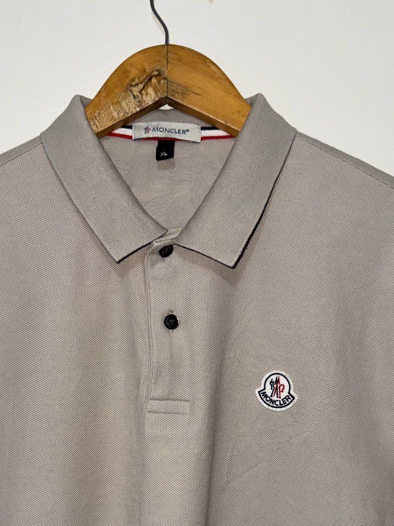 Monclear Light Brown Polo Shirt (Category: Luxury Apparel) located in Bacolod City. Submitted by thriftppy_ (Listing ID 1471154328, Image 3). Description: MONCLEAR LIGHT BROWN POLO SHIRT Size: XL Width: 22 Length: 28 Color rate: 9.8/10 Condition: Excellent near new Issue: None 💰1.5 DM for sure buyers 📥 Mode of payment:GCASH, BANK TRANSFER Unli vouch and vc for safety transaction. 📌Color may vary due to lighting📸 📦 Shipping via JNT EXPRESS🚚 