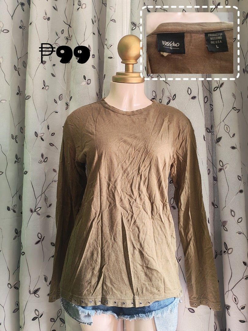 Mossimo Brown Long Sleeve Shirt Size L (Category: Coats, Jackets and Outerwear) located in Caloocan City. Submitted by _misskaye (Listing ID 1471145469, Image 1). Description: - Brand: Mossimo - Size: Large (tag attached) - Color: Army green - Neckline: Crew neck - Details: Metal grommets along the bottom hemline - Fabric: Ribbed texture throughout - Style: Easy to pair with denim jeans or shorts.