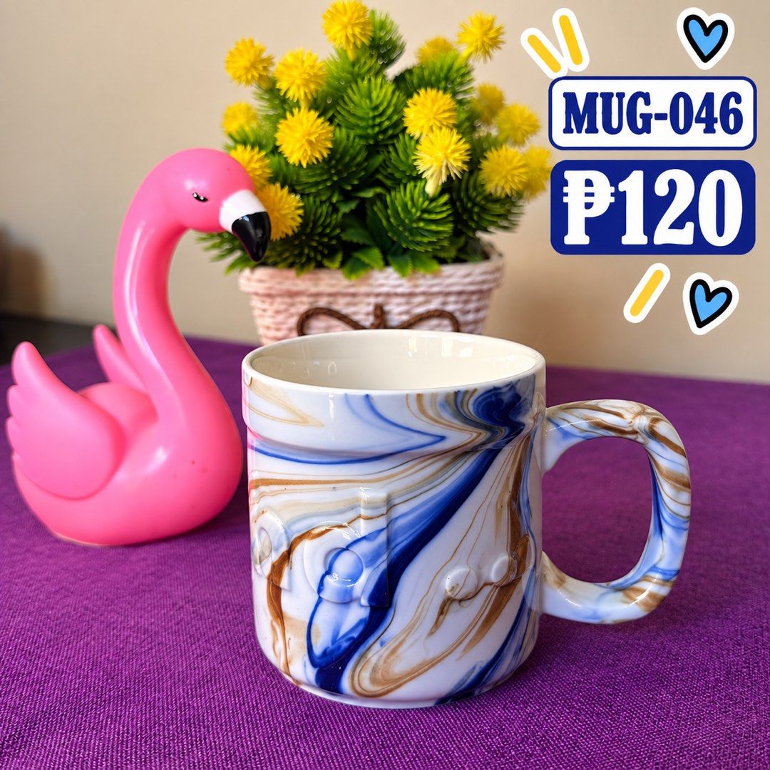 MUG-046 Blue and Brown Marble Ceramic Mug (Category: Coffee & Tea Tableware) located in Manila. Submitted by zamarah08 (Listing ID 1471208576, Image 1). Description: - Eye-catching blue, brown, and white marble swirl pattern - Unique tactile experience with textured lettering and raised dots - Fully glossy finish, including the comfortable handle - Solid, heavy-duty build quality for everyday use - Perfect for both hot and cold drinks - Item Code