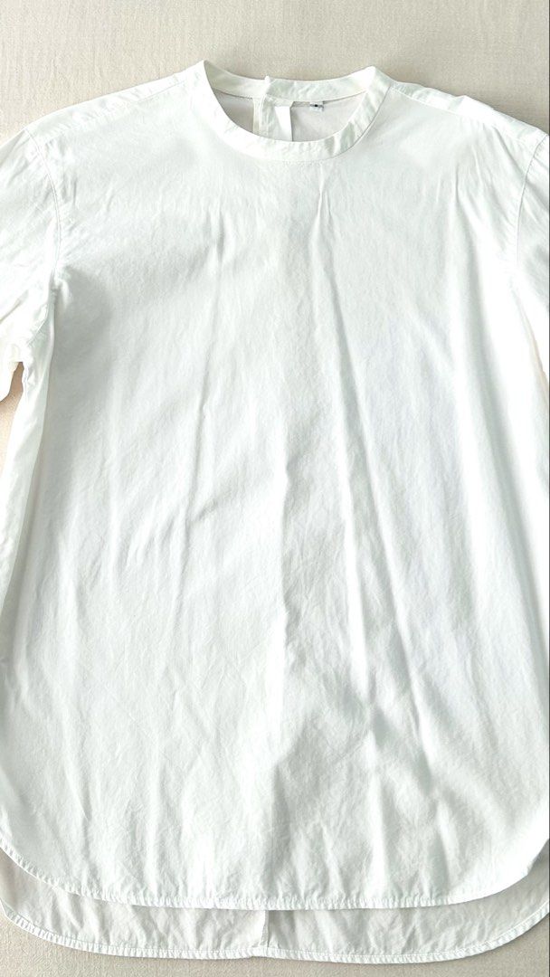 Muji 3/4 sleeve white tunic (Category: Blouses) located in Kawit. Submitted by apuchiko (Listing ID 1471148307, Image 3). Description: Washed but never been used. Natago lang sa cabinet. Size: small.