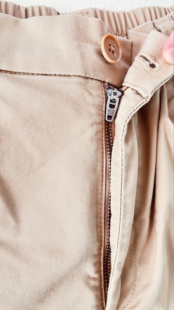 Muji khaki shorts (Category: Shorts) located in Kawit. Submitted by apuchiko (Listing ID 1471146585, Image 3). Description: Lightly used small size Muji khaki shorts. Zippers, button all functioning well. No stains, all stitches are still intact. Color: 9/10.