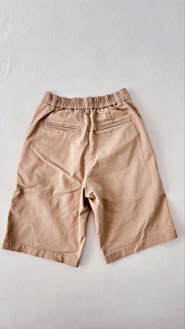 Muji khaki shorts (Category: Shorts) located in Kawit. Submitted by apuchiko (Listing ID 1471146585, Image 2). Description: Lightly used small size Muji khaki shorts. Zippers, button all functioning well. No stains, all stitches are still intact. Color: 9/10.