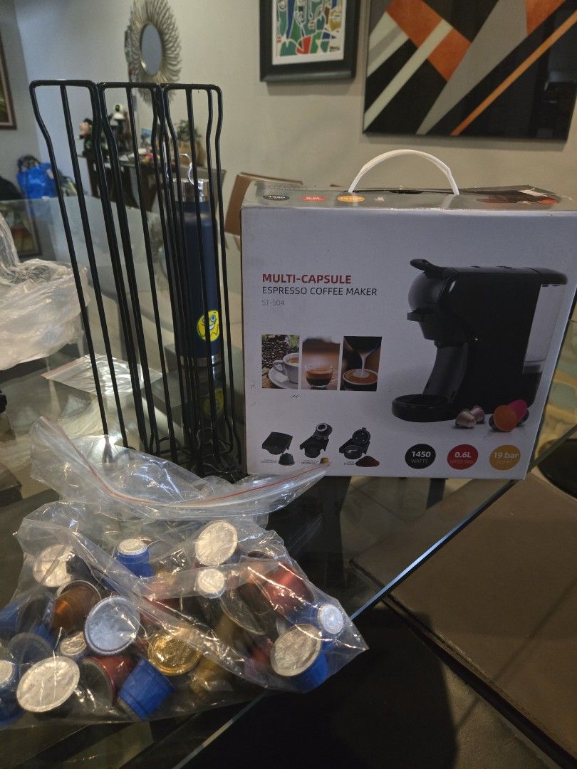 Multi-Capsule Espresso Coffee Maker ST-504 (Category: Coffee Machines & Makers) located in Pasig City. Submitted by izzy0202 (Listing ID 1471170131, Image 1). Description: - Brand new & unopened ST-504 multi-capsule espresso maker - 1450 watts power with a 19-bar Italian-style pump for rich crema - 3-in-1 versatility: includes adapters for Nespresso, Dolce Gusto, and ground coffee - Compact 0.6L water tank capacity - Easy electronic button contro