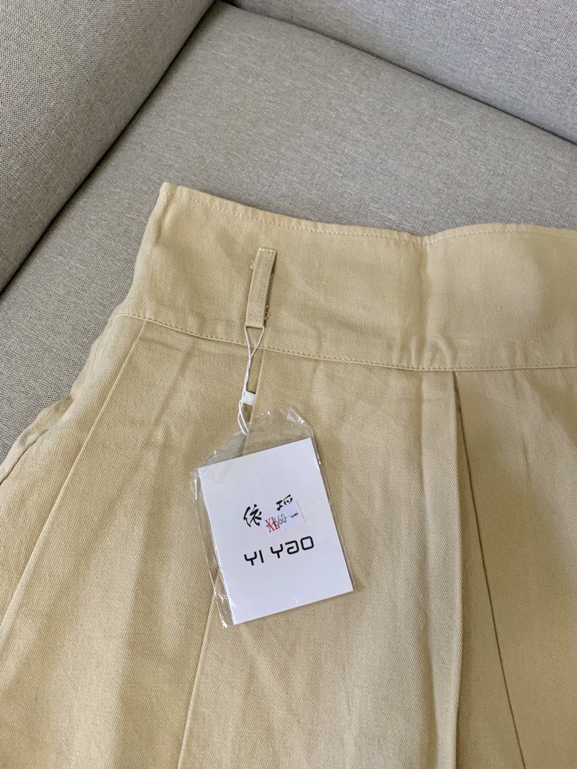 New Khaki y2k skirt (Category: Skirts) located in Paranaque City. Submitted by shoplovedbya (Listing ID 1471208446, Image 2). Description: ♡ Waist: 28-30 ♡ Hips: up to 38 ♡ Length: 14.5 - L on tag - has inner shorts and belt slot .