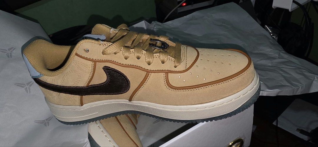 Nike Air Force 1 Low Kobe Bryant (Category: Sneakers) located in Manila. Submitted by adanielbm (Listing ID 1471133907, Image 2). Description: 2x stock size 10 and 11 - Model: Nike Air Force 1 Low Wheat Suede - Design: Dark brown hairy swooshes, light blue heel tab, and tongue patch with embroidered Kobe Bryant sheath logo - Extras: Special horseshoe lace dubrae included - Sole: Clear translucent outsole with signature branding - Condition: Brand