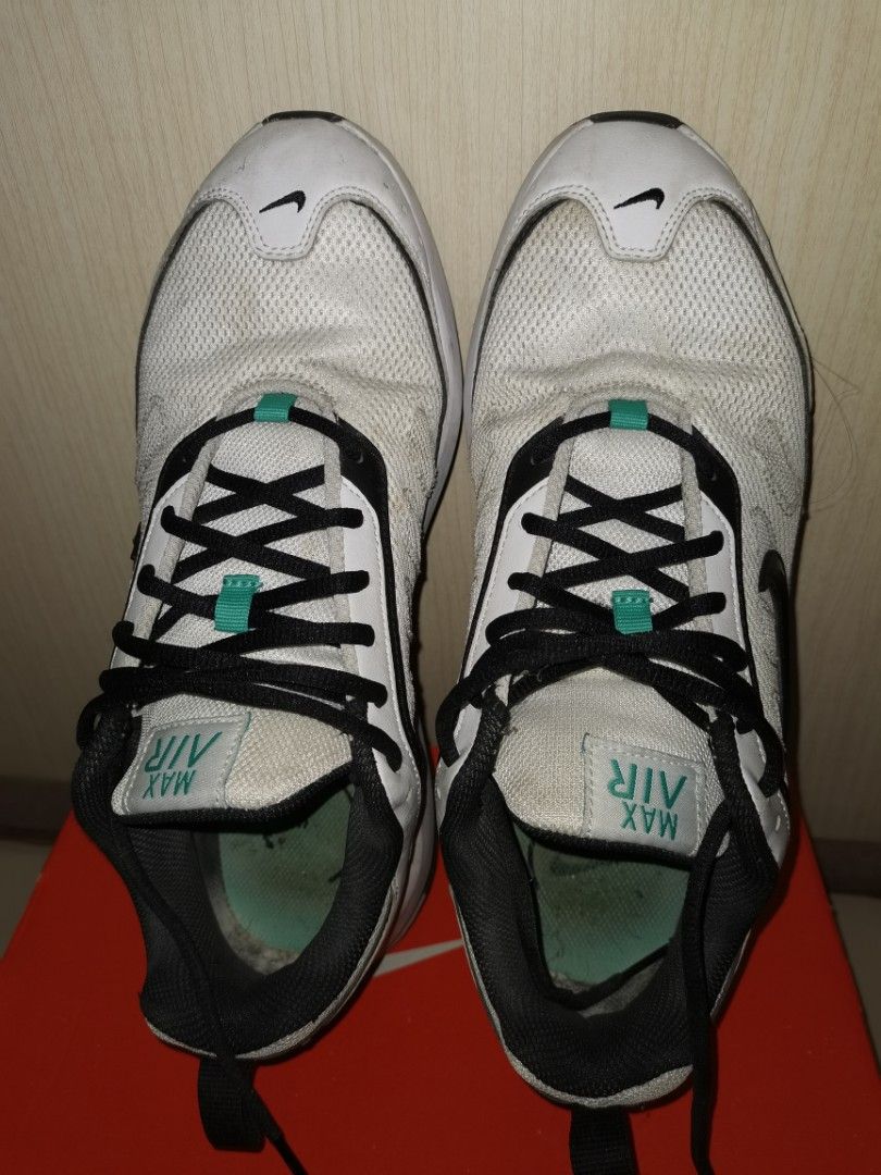Nike Air Max White Black Teal Sneakers (Category: Sneakers) located in Pasig City. Submitted by raindeclutters (Listing ID 1471260636, Image 1). Description: Nike Air Max sneakers in white with black and teal accents. Mesh upper with black laces. Classic Air unit visible in the sole. Worn a few times, soles show slight dirt. Still lots of life left in them. Comfortable daily wear shoes. Price is negotiable. .