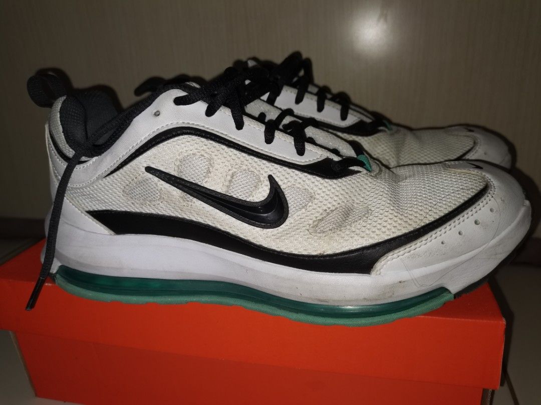Nike Air Max White Black Teal Sneakers (Category: Sneakers) located in Pasig City. Submitted by raindeclutters (Listing ID 1471260636, Image 3). Description: Nike Air Max sneakers in white with black and teal accents. Mesh upper with black laces. Classic Air unit visible in the sole. Worn a few times, soles show slight dirt. Still lots of life left in them. Comfortable daily wear shoes. Price is negotiable. .
