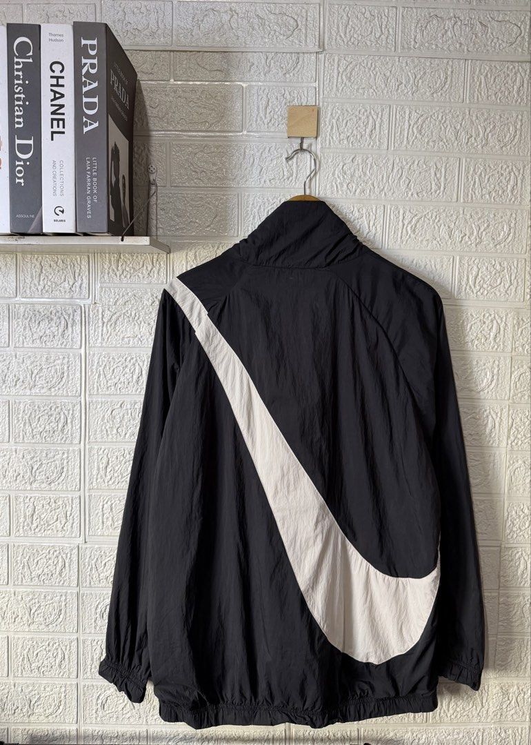 NIKE BIG SWOOSH WOVEN JACKET (Category: Coats, Jackets and Outerwear) located in Baguio. Submitted by kds_stuffs (Listing ID 1471157509, Image 2). Description: Mine: 850 📍N1K3 big swoosh woven jacket 😍 Size: Large Dimension: 27L x 23W Color rate: 9/10 Issue: ❌ Excellent condition Need wash Gandara neto 💗.