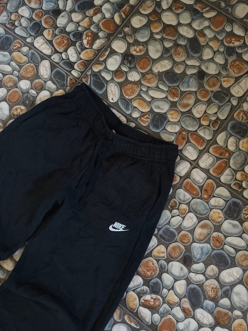 Nike Black Sweatpants Size M FB2728-010 (Category: Joggers) located in Baler. Submitted by vansonearth (Listing ID 1471131489, Image 2). Description: - Brand: Nike - Style: Black sweatpants with white swoosh logo - Size: Medium - Features: Adjustable drawstring waistband - Condition/Origin: Made in China, comfortable casual wear - Ideal for: Everyday lounging, errands, or workouts.