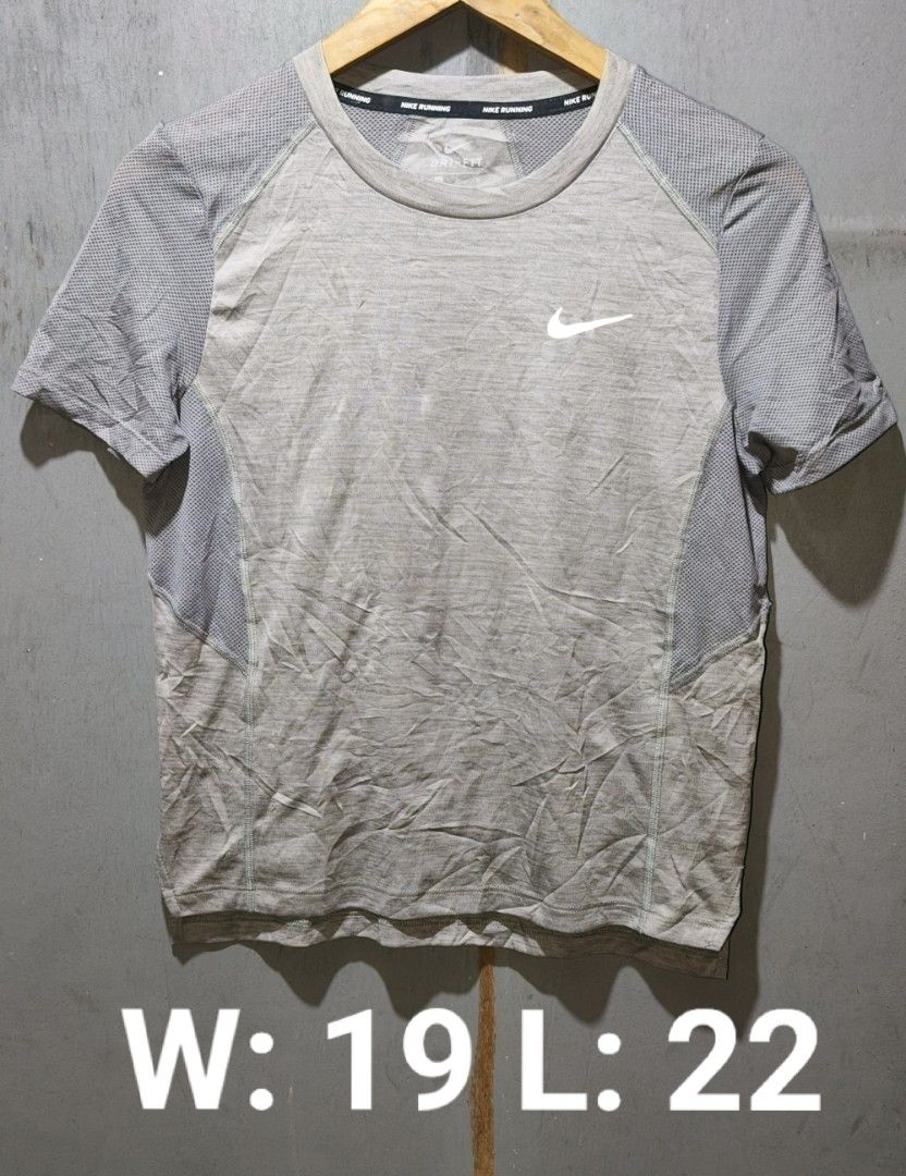NIKE DRI FIT T-SHIRT (Category: Activewear) located in Makati City. Submitted by updownthrift (Listing ID 1471289508, Image 1). Description: NEED WASH CUT WASH TAG AUTHENTIC.