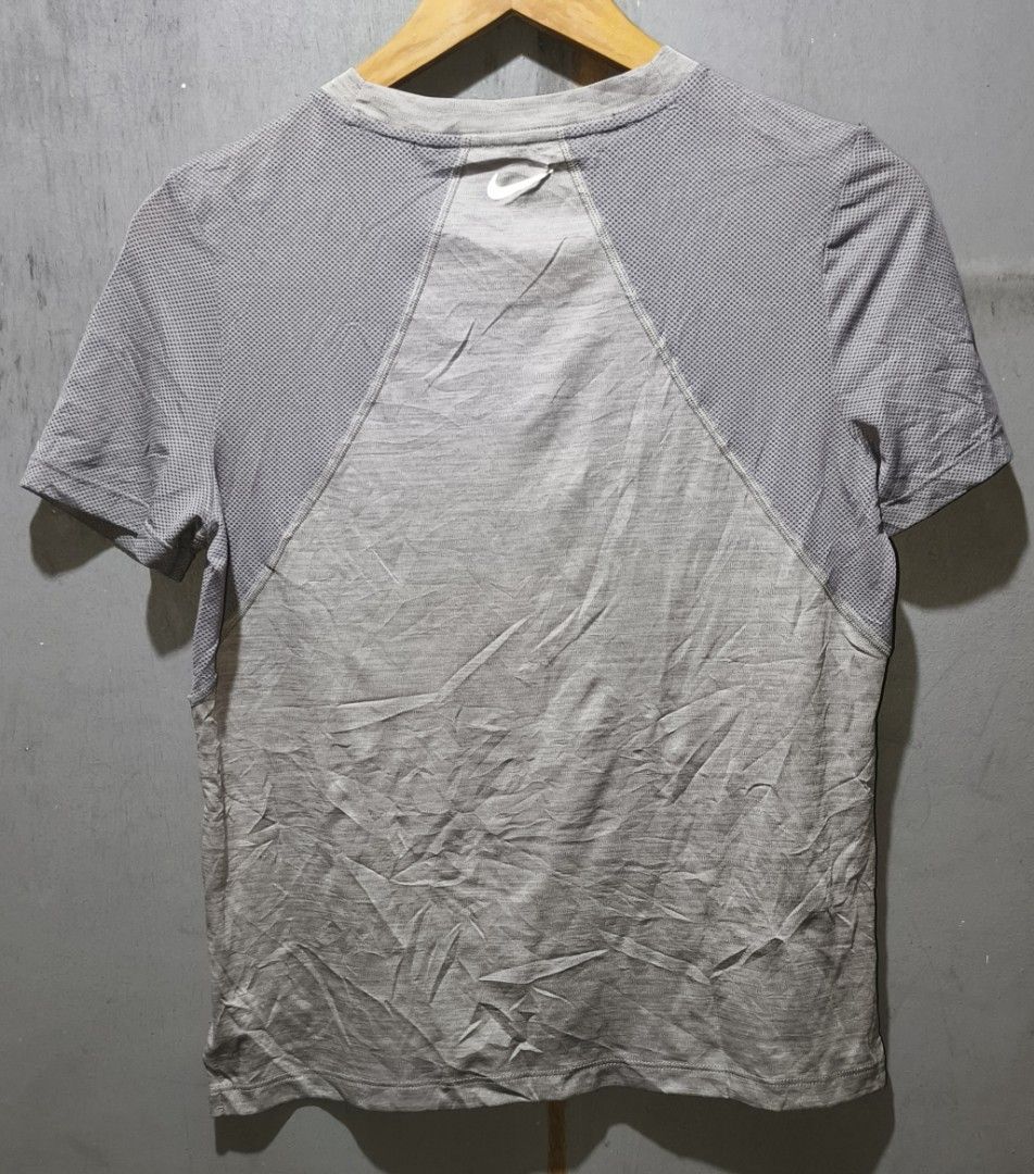 NIKE DRI FIT T-SHIRT (Category: Activewear) located in Makati City. Submitted by updownthrift (Listing ID 1471289508, Image 2). Description: NEED WASH CUT WASH TAG AUTHENTIC.