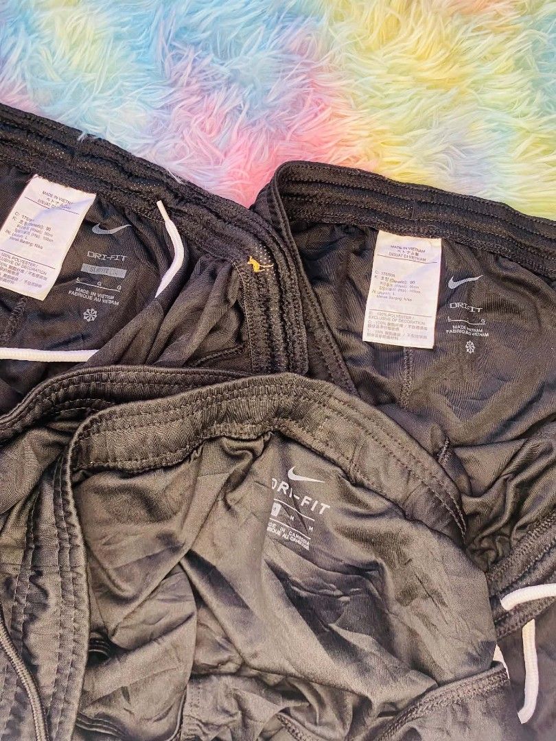 Nike Dri-FIT Black Athletic Shorts Bundle (Size L & M) (Category: Shorts) located in Manila. Submitted by jeancharis67207 (Listing ID 1471142227, Image 2). Description: - Brand: Nike - Item: Dri-FIT Athletic Shorts Bundle (Set of 3) - Color: Black with white swoosh logos and drawstrings - Sizes: 2x Large, 1x Medium - Material: Lightweight and breathable - Condition: Great for workouts, running, or casual wear - Note: Selling as a complete bundle 