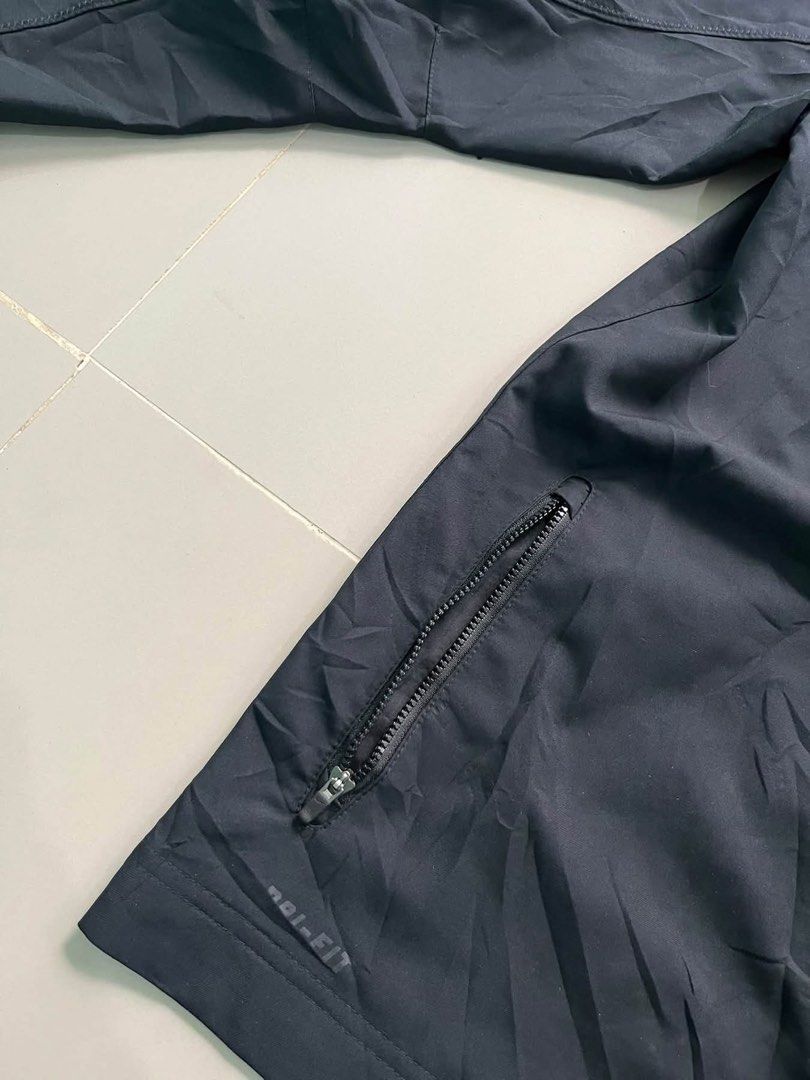 Nike Dri-FIT Black Zip Jacket Size L (Category: Coats, Jackets and Outerwear) located in Lapu Lapu. Submitted by trip-thrift (Listing ID 1471147038, Image 3). Description: Black Nike Dri-FIT zip-up jacket. High collar, full zipper front, zippered side pockets. Tonal swoosh embroidery on the chest. 100 percent polyester fabric. Size L on the tag, fits height 170 to 180 cm. Great lightweight layer for workouts or casual wear..