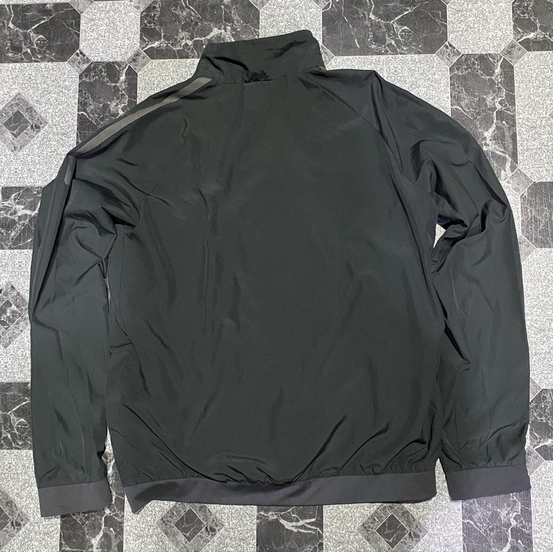 Nike Dri-FIT Black Zip-Up Training Jacket Size L (Category: Coats, Jackets and Outerwear) located in Baguio. Submitted by flynes (Listing ID 1471261185, Image 2). Description: - Brand: Nike - Item: Dri-FIT Training Jacket - Color: Black with subtle gray reflective stripe - Size: Large - Dimensions: L- 25.5”, w-21”, sleeves-24” - Material: 100% polyester with breathable mesh interior lining - Features: Full zip closure, high collar, embossed Nike 