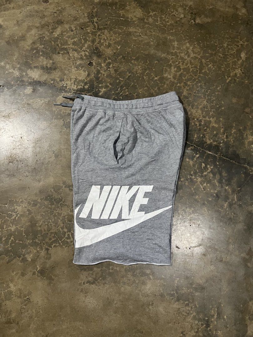Nike Gray Shorts with Large Logo Size L (Category: Shorts) located in Oroquieta. Submitted by zjstg (Listing ID 1471269168, Image 1). Description: - Brand: Nike - Color: Gray with big white logo - Size: L (Product Code: AT3070-091) - Material: 100% Cotton - Features: Drawstring waistband, side pockets, and raw-cut hem -W: 26-34 -Length: 18 -Excellent/No issue -350+sf .